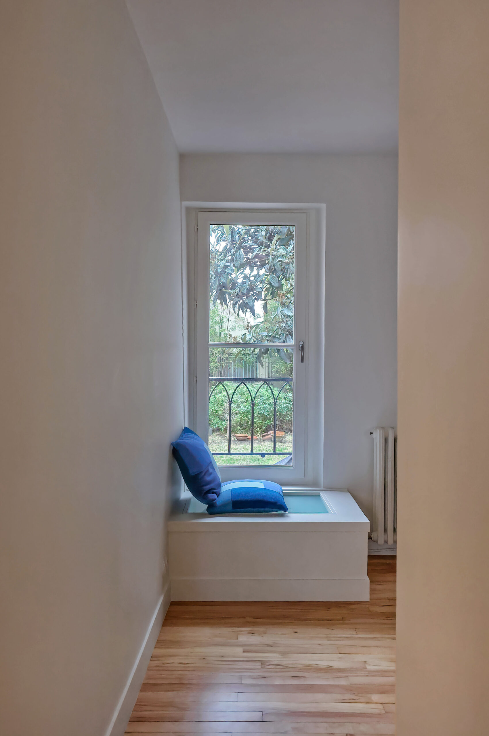 Window onto garden. Interior designer Flora Auvray